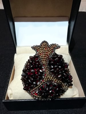 Brooch "Pomegranate with natural stones"